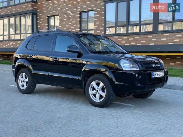 Черный Хендай Туксон, объемом двигателя 1.98 л и пробегом 286 тыс. км за 7300 $, фото 10 на Automoto.ua
