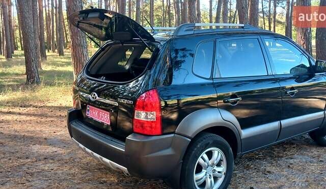 Хендай Туксон 2007 в Сумах на Automoto.ua Черный Хендай Туксон, объемом двигателя 1.98 л и пробегом 236 тыс. км за 7600 $, фото 7 на Automoto.ua