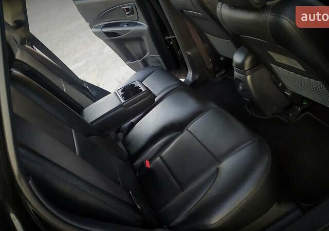 Черный Хендай Туксон, объемом двигателя 2 л и пробегом 230 тыс. км за 8600 $, фото 183 на Automoto.ua
