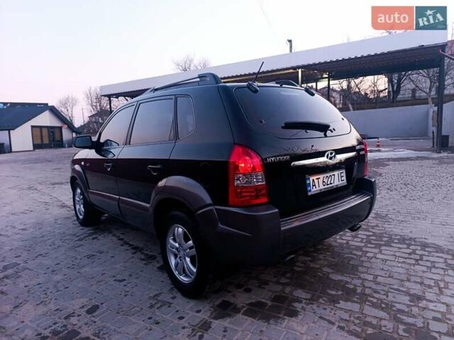 Черный Хендай Туксон, объемом двигателя 2 л и пробегом 280 тыс. км за 9500 $, фото 17 на Automoto.ua