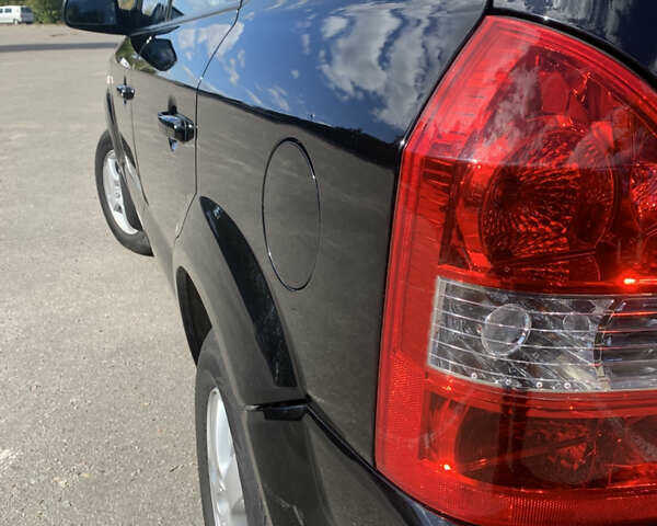 Чорний Хендай Туксон, об'ємом двигуна 2 л та пробігом 56 тис. км за 9500 $, фото 31 на Automoto.ua