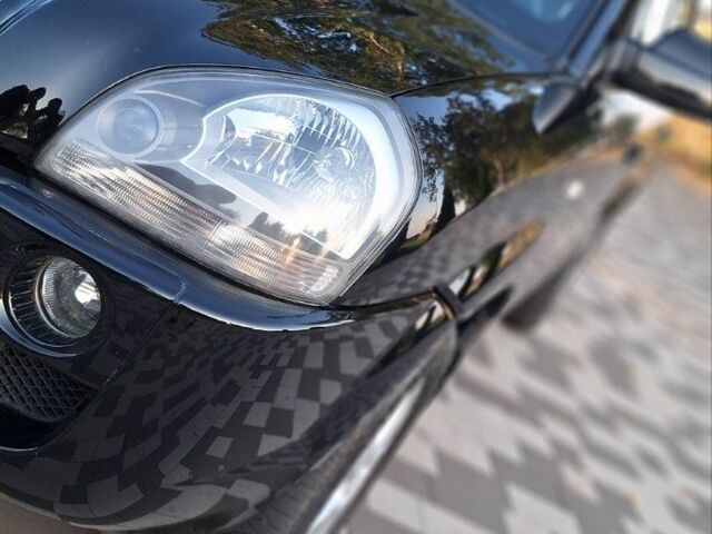 Чорний Хендай Туксон, об'ємом двигуна 2 л та пробігом 190 тис. км за 8300 $, фото 6 на Automoto.ua