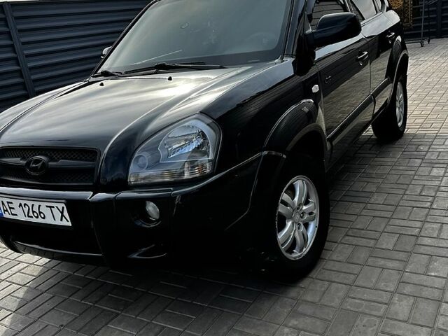 Чорний Хендай Туксон, об'ємом двигуна 2 л та пробігом 240 тис. км за 8600 $, фото 1 на Automoto.ua