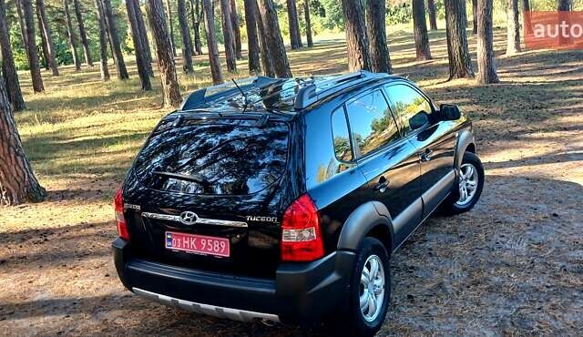 Хендай Туксон 2007 в Сумах на Automoto.ua Черный Хендай Туксон, объемом двигателя 1.98 л и пробегом 236 тыс. км за 7600 $, фото 8 на Automoto.ua
