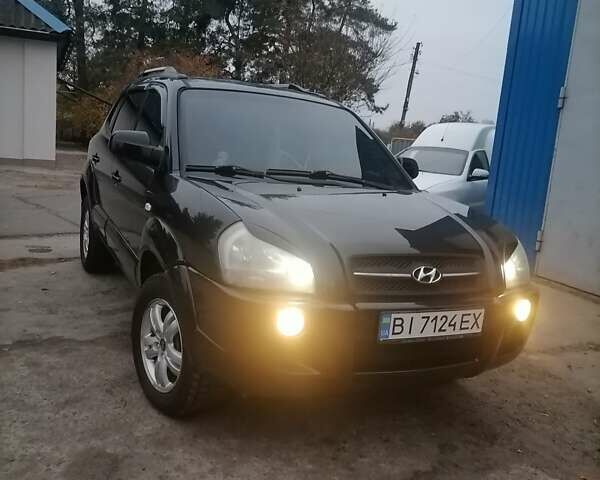 Черный Хендай Туксон, объемом двигателя 1.98 л и пробегом 238 тыс. км за 8400 $, фото 1 на Automoto.ua