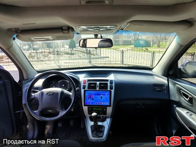 Чорний Хендай Туксон, об'ємом двигуна 2 л та пробігом 350 тис. км за 7500 $, фото 2 на Automoto.ua