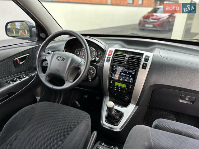 Хендай Туксон 2007 в Ужгороде на Automoto.ua Черный Хендай Туксон, объемом двигателя 1.98 л и пробегом 157 тыс. км за 7300 $, фото 2 на Automoto.ua