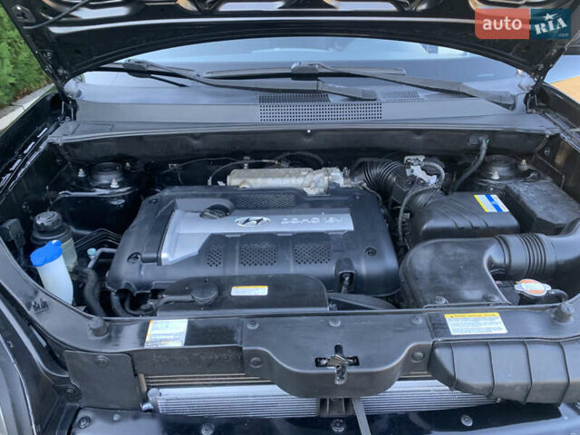 Чорний Хендай Туксон, об'ємом двигуна 2 л та пробігом 56 тис. км за 9500 $, фото 23 на Automoto.ua