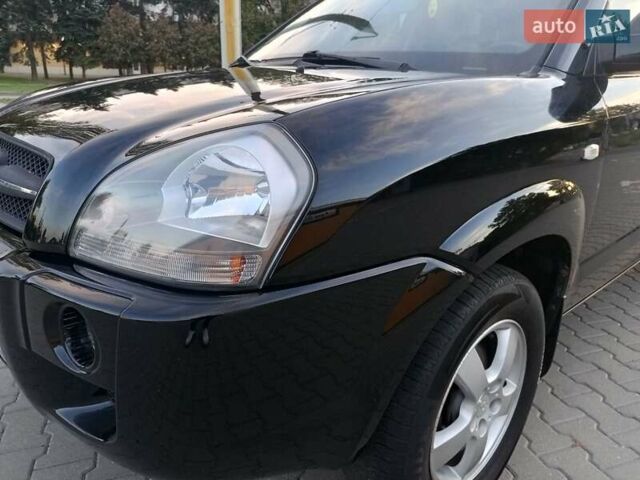 Чорний Хендай Туксон, об'ємом двигуна 1.98 л та пробігом 192 тис. км за 7950 $, фото 13 на Automoto.ua