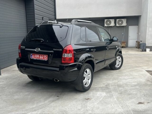 Черный Хендай Туксон, объемом двигателя 2 л и пробегом 179 тыс. км за 8000 $, фото 2 на Automoto.ua