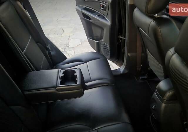 Черный Хендай Туксон, объемом двигателя 2 л и пробегом 230 тыс. км за 8600 $, фото 185 на Automoto.ua