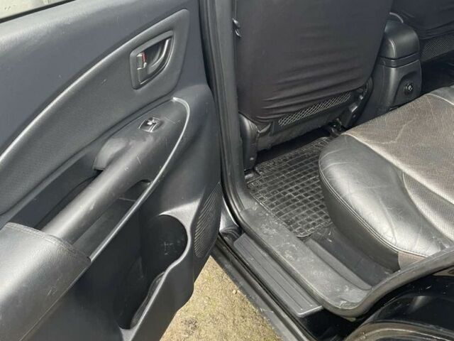 Чорний Хендай Туксон, об'ємом двигуна 2 л та пробігом 230 тис. км за 5999 $, фото 7 на Automoto.ua