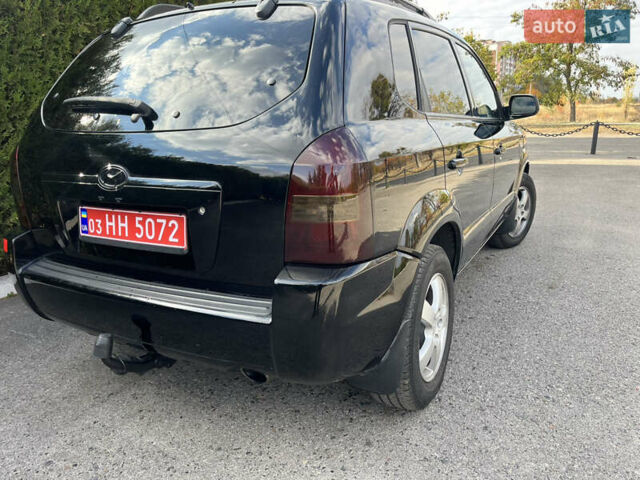 Черный Хендай Туксон, объемом двигателя 2 л и пробегом 256 тыс. км за 7800 $, фото 9 на Automoto.ua