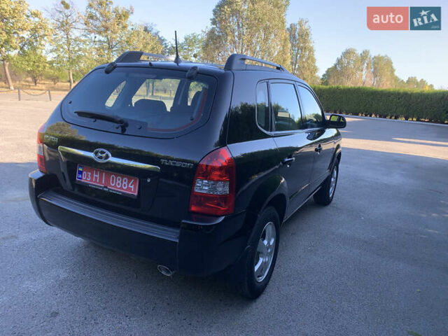 Чорний Хендай Туксон, об'ємом двигуна 2 л та пробігом 56 тис. км за 9500 $, фото 6 на Automoto.ua