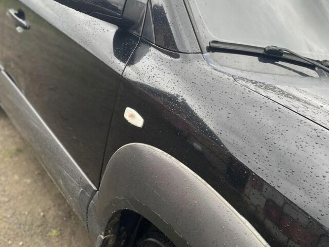 Чорний Хендай Туксон, об'ємом двигуна 2 л та пробігом 230 тис. км за 5999 $, фото 1 на Automoto.ua