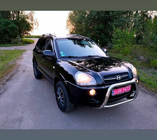 Черный Хендай Туксон, объемом двигателя 2 л и пробегом 165 тыс. км за 9900 $, фото 6 на Automoto.ua
