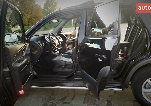 Черный Хендай Туксон, объемом двигателя 2 л и пробегом 230 тыс. км за 8600 $, фото 197 на Automoto.ua