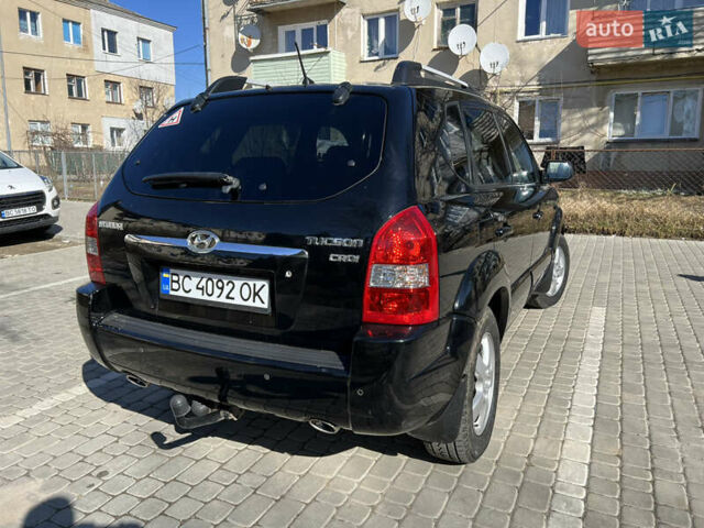 Чорний Хендай Туксон, об'ємом двигуна 2 л та пробігом 181 тис. км за 7799 $, фото 10 на Automoto.ua