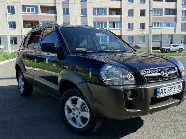 Черный Хендай Туксон, объемом двигателя 2 л и пробегом 186 тыс. км за 8000 $, фото 4 на Automoto.ua
