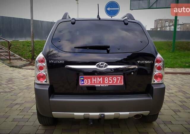 Чорний Хендай Туксон, об'ємом двигуна 2 л та пробігом 229 тис. км за 8600 $, фото 45 на Automoto.ua