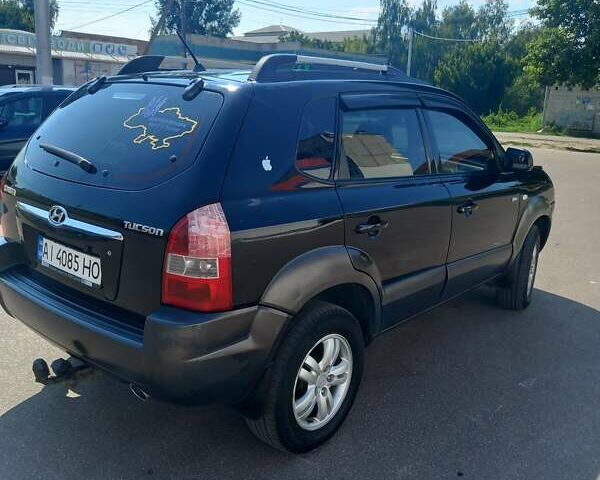 Чорний Хендай Туксон, об'ємом двигуна 1.98 л та пробігом 357 тис. км за 7500 $, фото 8 на Automoto.ua