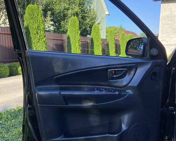 Черный Хендай Туксон, объемом двигателя 1.98 л и пробегом 197 тыс. км за 8000 $, фото 32 на Automoto.ua