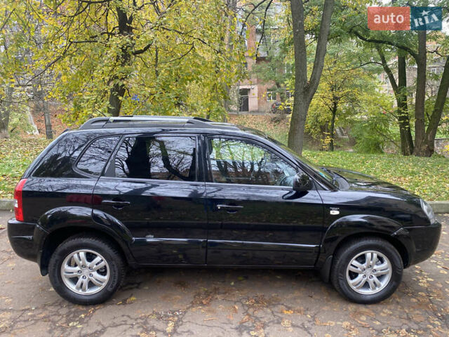 Черный Хендай Туксон, объемом двигателя 2 л и пробегом 178 тыс. км за 7860 $, фото 5 на Automoto.ua