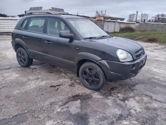 Черный Хендай Туксон, объемом двигателя 2 л и пробегом 280 тыс. км за 3500 $, фото 2 на Automoto.ua