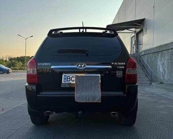 Черный Хендай Туксон, объемом двигателя 1.99 л и пробегом 231 тыс. км за 8500 $, фото 12 на Automoto.ua