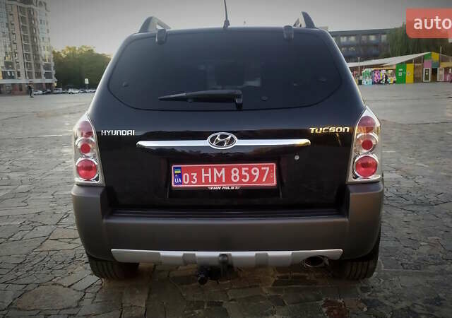 Черный Хендай Туксон, объемом двигателя 2 л и пробегом 230 тыс. км за 8600 $, фото 17 на Automoto.ua