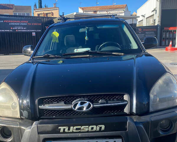 Чорний Хендай Туксон, об'ємом двигуна 1.98 л та пробігом 215 тис. км за 7540 $, фото 1 на Automoto.ua