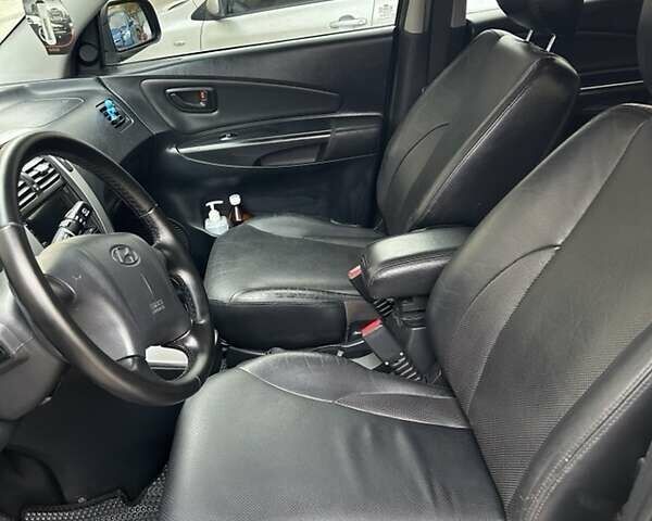 Черный Хендай Туксон, объемом двигателя 1.98 л и пробегом 147 тыс. км за 8000 $, фото 21 на Automoto.ua