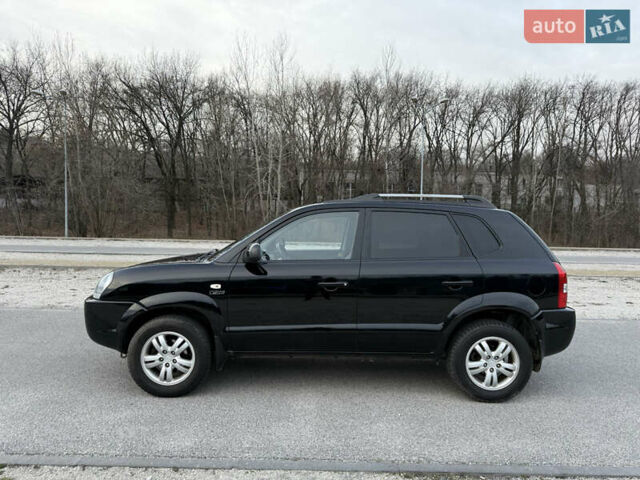 Черный Хендай Туксон, объемом двигателя 1.98 л и пробегом 159 тыс. км за 7600 $, фото 8 на Automoto.ua