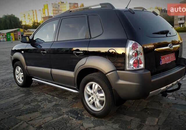 Черный Хендай Туксон, объемом двигателя 2 л и пробегом 230 тыс. км за 8600 $, фото 13 на Automoto.ua