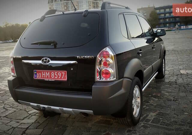 Черный Хендай Туксон, объемом двигателя 2 л и пробегом 230 тыс. км за 8600 $, фото 18 на Automoto.ua