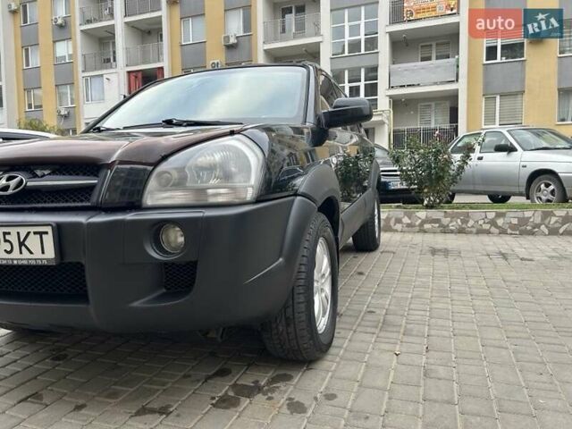 Черный Хендай Туксон, объемом двигателя 1.98 л и пробегом 147 тыс. км за 8000 $, фото 9 на Automoto.ua