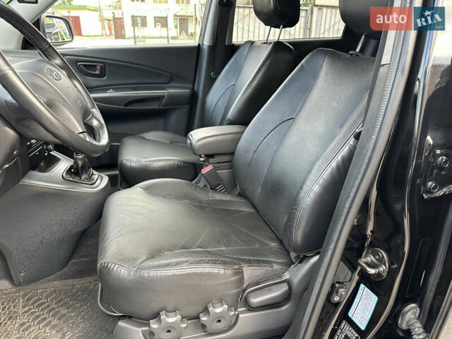 Чорний Хендай Туксон, об'ємом двигуна 2 л та пробігом 180 тис. км за 7999 $, фото 17 на Automoto.ua