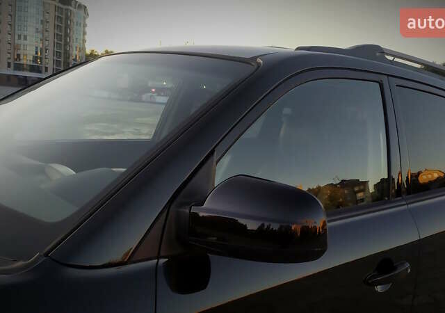 Черный Хендай Туксон, объемом двигателя 2 л и пробегом 230 тыс. км за 8600 $, фото 81 на Automoto.ua