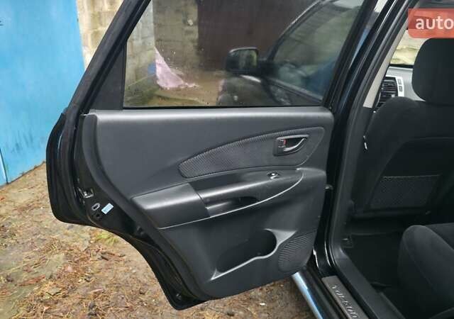 Чорний Хендай Туксон, об'ємом двигуна 2 л та пробігом 207 тис. км за 8200 $, фото 25 на Automoto.ua