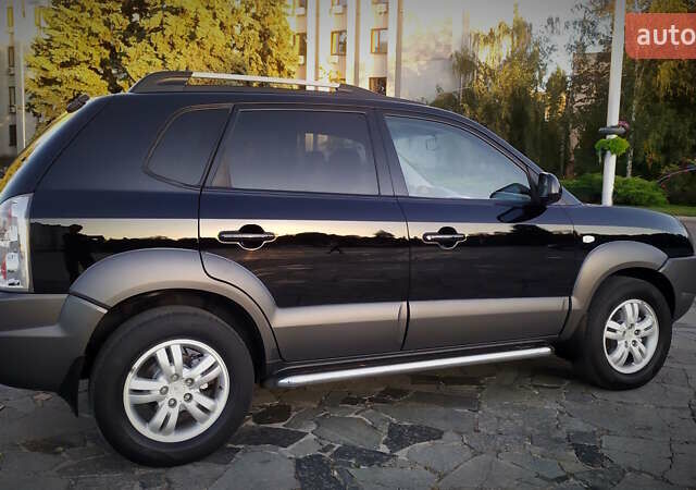Черный Хендай Туксон, объемом двигателя 2 л и пробегом 230 тыс. км за 8600 $, фото 37 на Automoto.ua