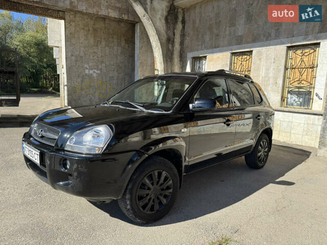 Черный Хендай Туксон, объемом двигателя 2 л и пробегом 189 тыс. км за 8250 $, фото 11 на Automoto.ua