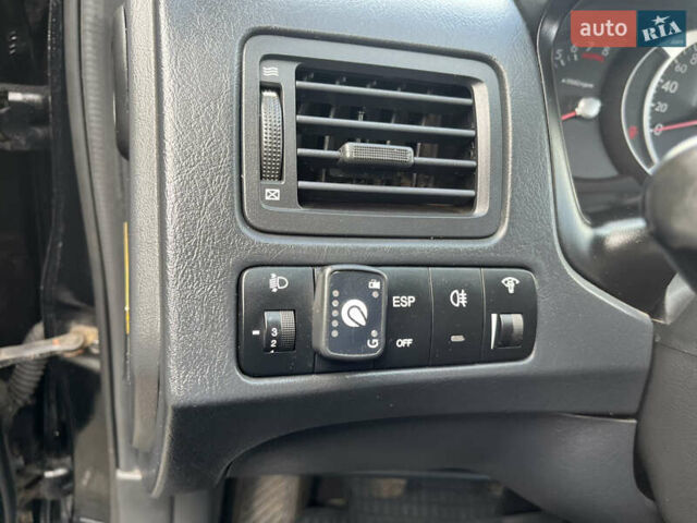 Черный Хендай Туксон, объемом двигателя 2 л и пробегом 256 тыс. км за 7800 $, фото 24 на Automoto.ua