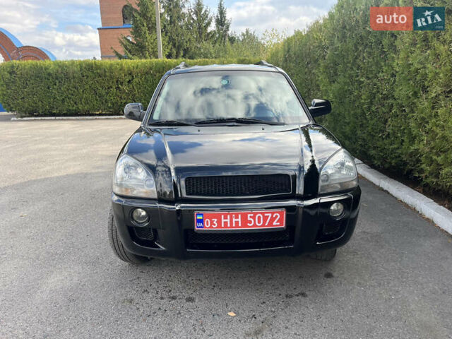 Черный Хендай Туксон, объемом двигателя 2 л и пробегом 256 тыс. км за 7800 $, фото 20 на Automoto.ua