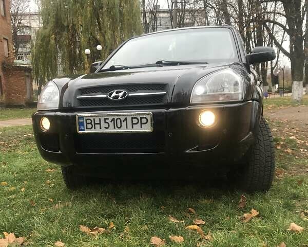 Черный Хендай Туксон, объемом двигателя 2 л и пробегом 210 тыс. км за 8999 $, фото 9 на Automoto.ua