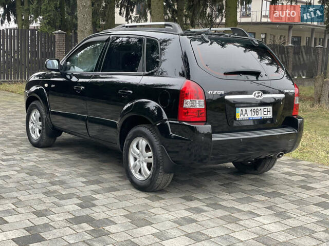 Черный Хендай Туксон, объемом двигателя 2 л и пробегом 180 тыс. км за 7700 $, фото 16 на Automoto.ua