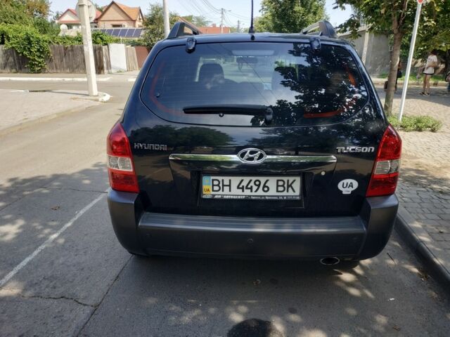 Чорний Хендай Туксон, об'ємом двигуна 2 л та пробігом 40 тис. км за 9000 $, фото 2 на Automoto.ua