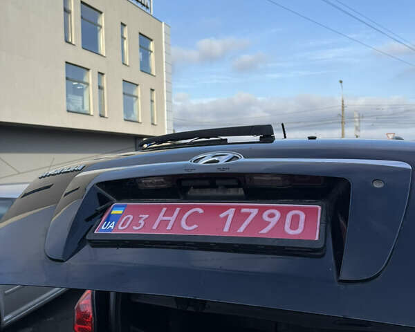 Черный Хендай Туксон, объемом двигателя 1.98 л и пробегом 230 тыс. км за 7750 $, фото 14 на Automoto.ua