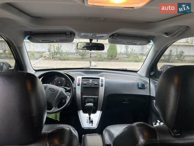 Черный Хендай Туксон, объемом двигателя 1.98 л и пробегом 147 тыс. км за 8000 $, фото 20 на Automoto.ua