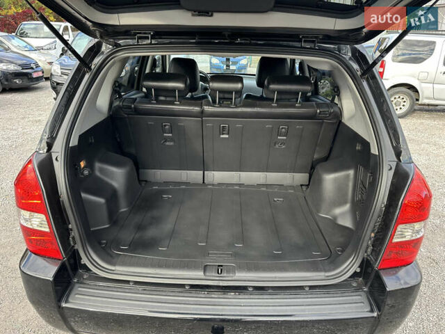 Чорний Хендай Туксон, об'ємом двигуна 2 л та пробігом 180 тис. км за 7999 $, фото 13 на Automoto.ua