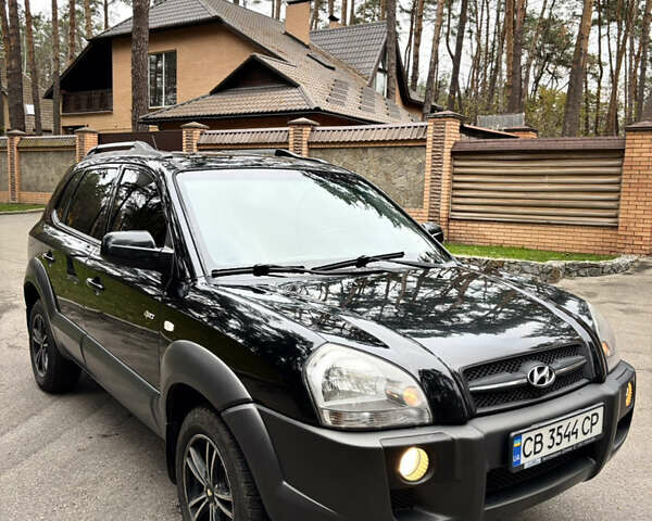 Черный Хендай Туксон, объемом двигателя 1.99 л и пробегом 266 тыс. км за 7500 $, фото 16 на Automoto.ua